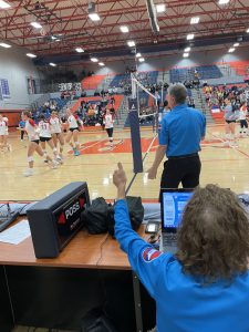 VOlleyball scorer at TSSAA tournament working with the R2